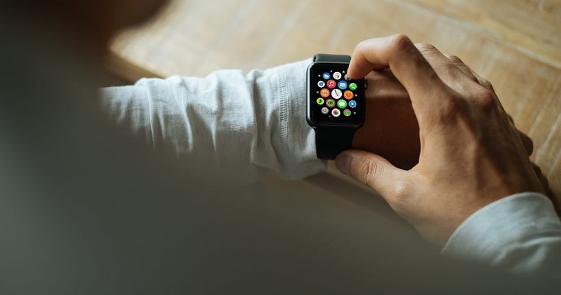 an employee using apple watch during work