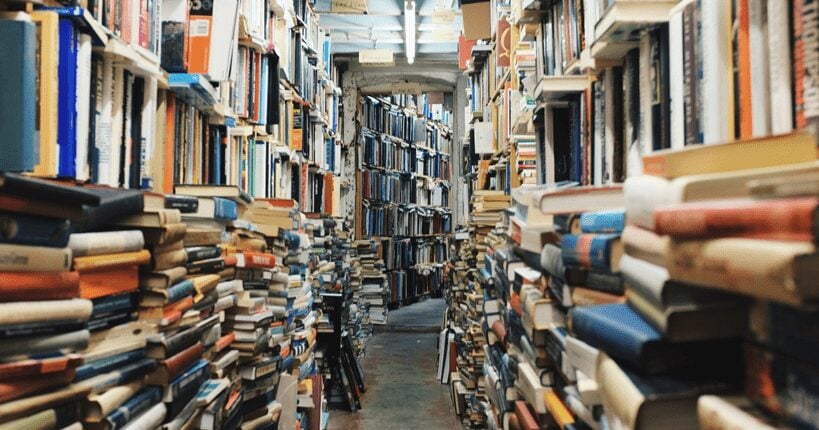 room full of books with colorful spines