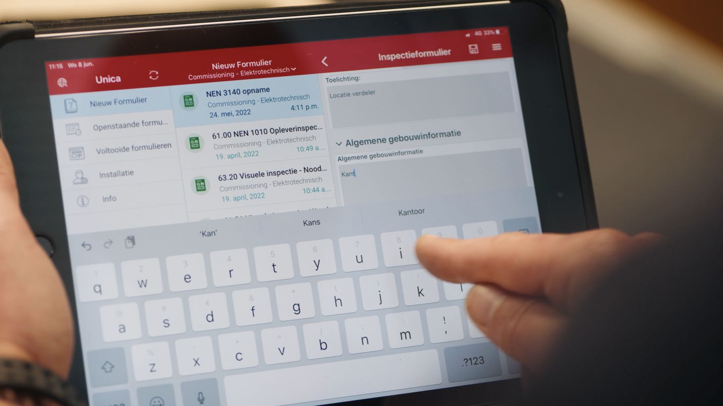 Unica Resco Inspections entering text on a tablet