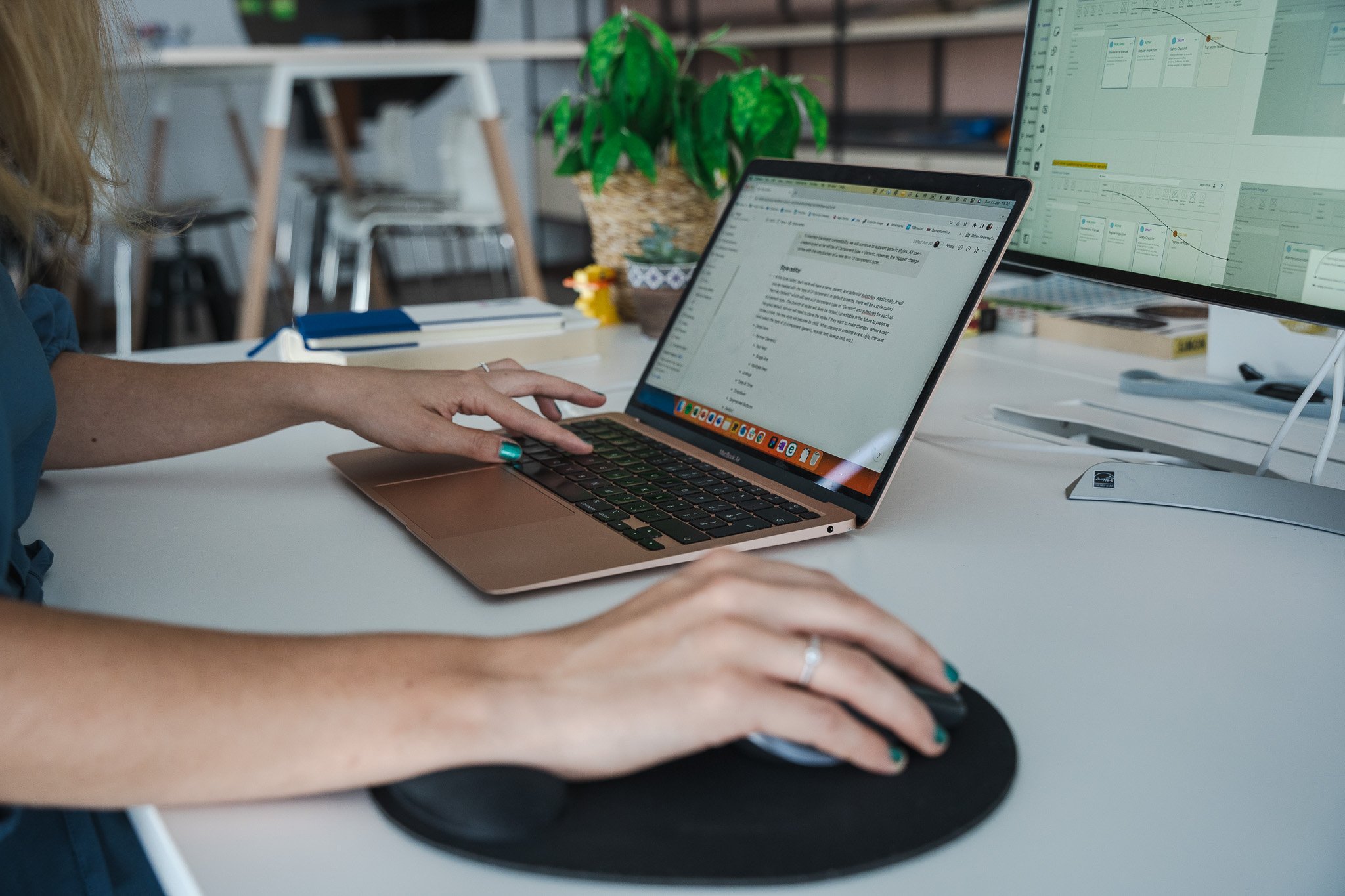 UX researcher working at her laptop